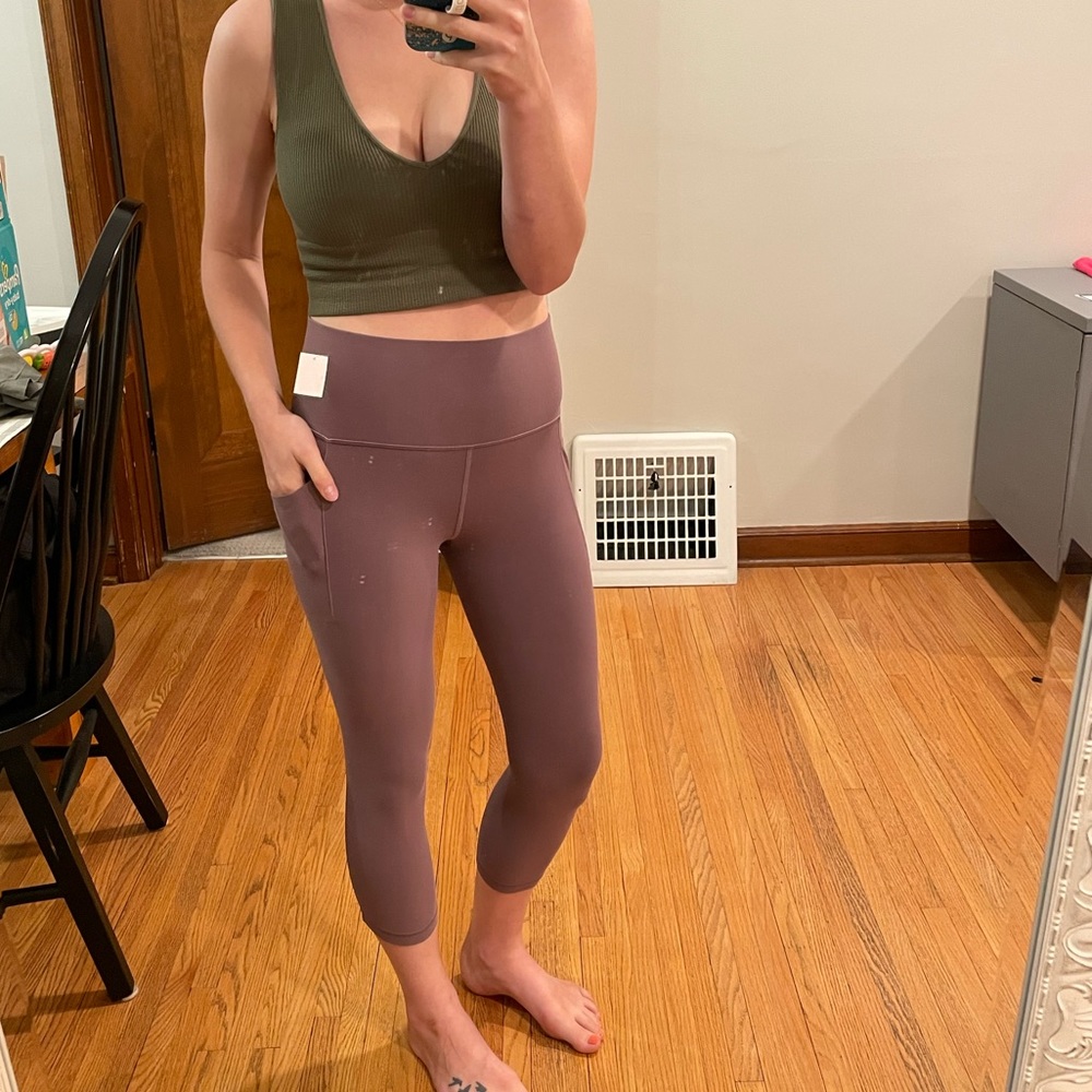 Athleta Salutation Stash Pocket Tight Size Medium